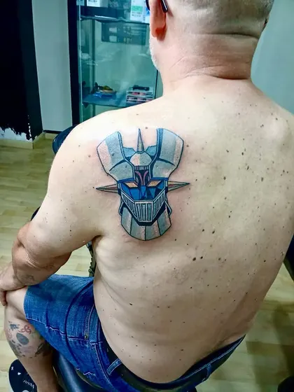 Máscara azul — Espalda